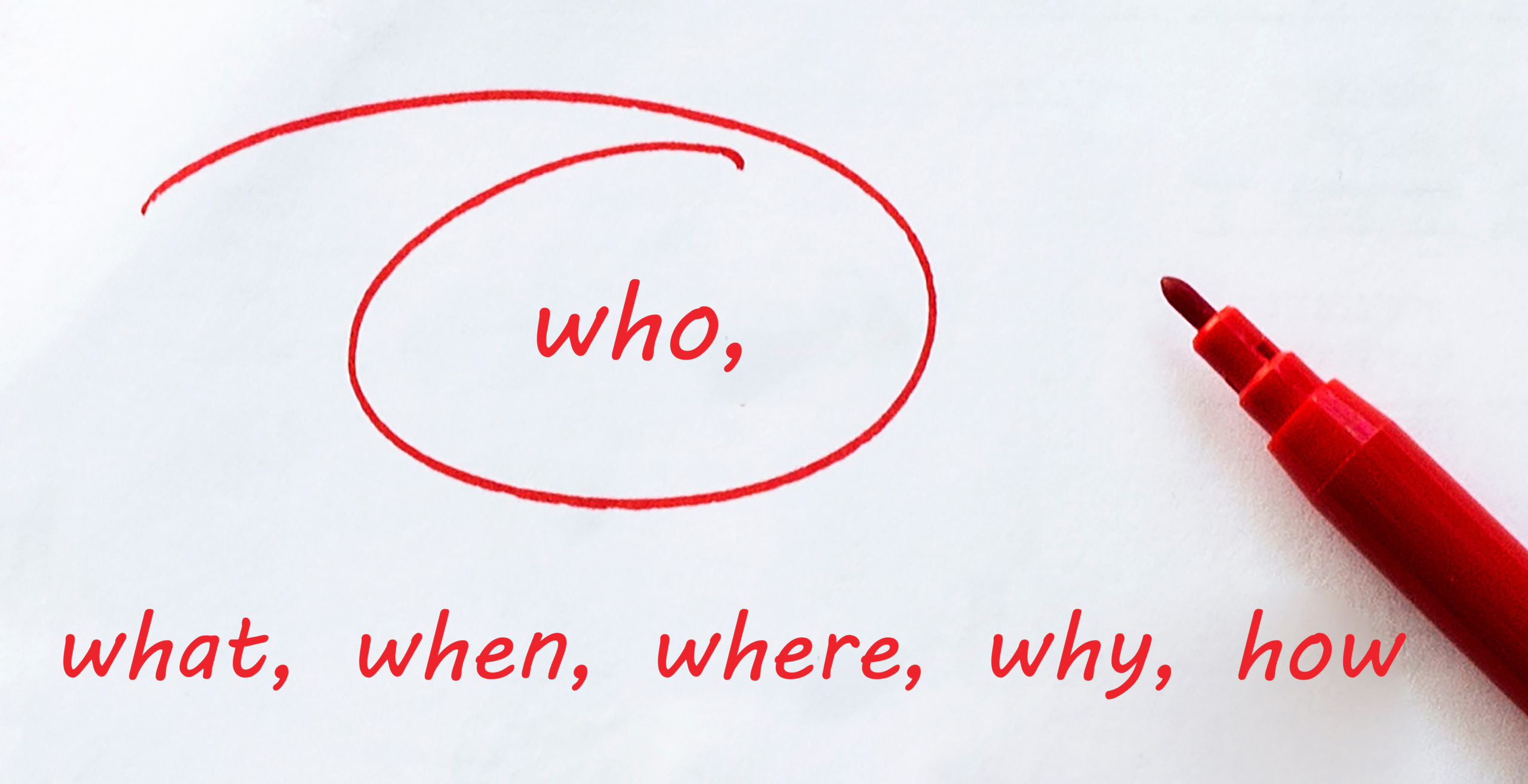 赤ペンで強調される「who」の文字